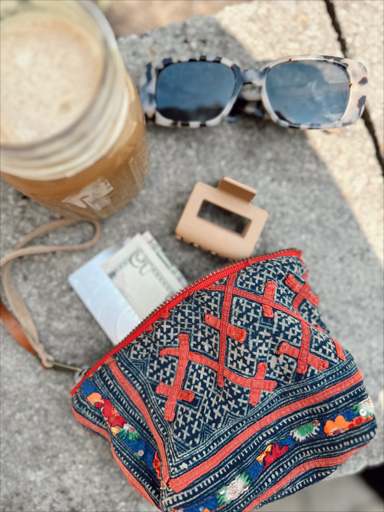 Harlow Moon in Hanoi with Brown Leather Wristlet