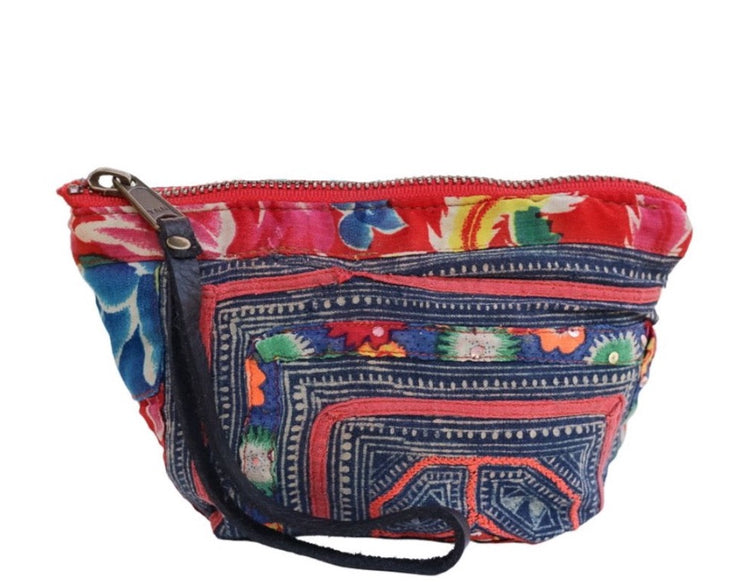 Harlow Moon in Hanoi with Black Leather Wristlet