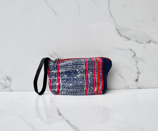 Harlow Moon in Barcelona with Black Leather Wristlet