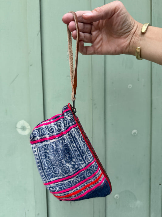 Harlow Moon in Barcelona with Brown Leather Wristlet